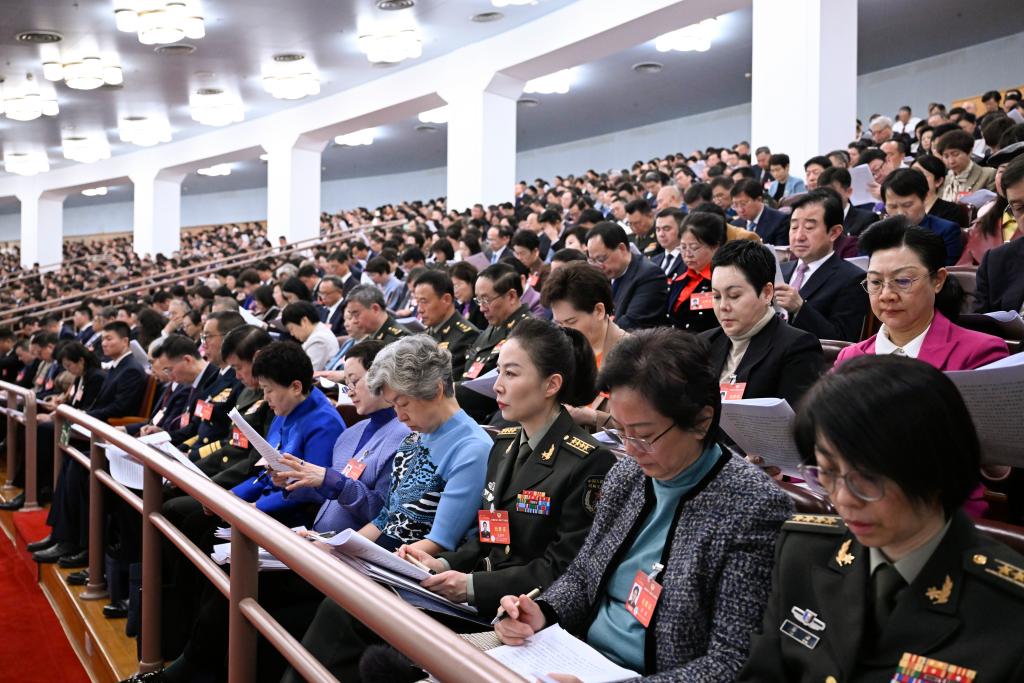 3月5日，第十四屆全國人民代表大會第二次會議在北京人民大會堂開幕。這是全國政協(xié)委員列席大會。新華社記者 申宏 攝