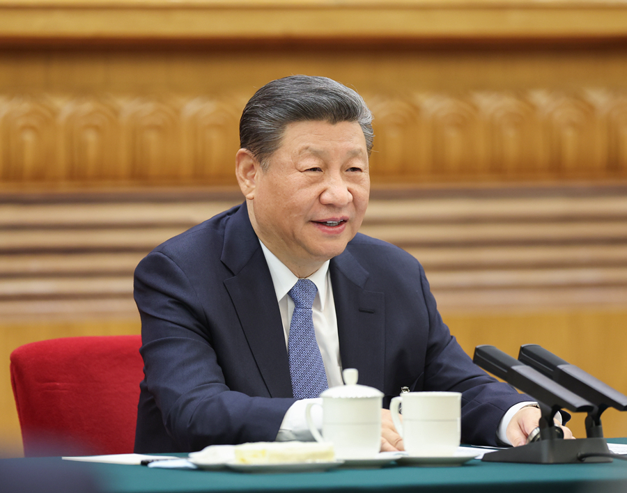3月5日，中共中央總書記、國(guó)家主席、中央軍委主席習(xí)近平參加他所在的十四屆全國(guó)人大二次會(huì)議江蘇代表團(tuán)審議。新華社記者 鞠鵬 攝