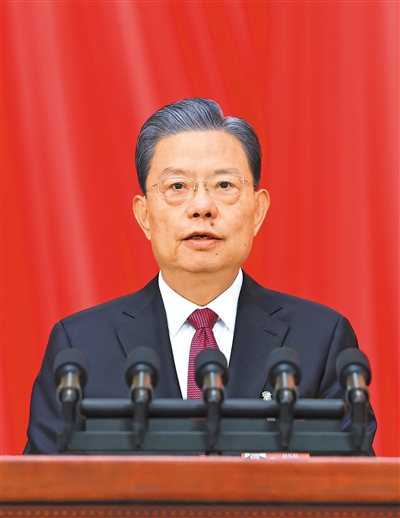 3月8日，十四屆全國人大二次會議在北京人民大會堂舉行第二次全體會議。受全國人大常委會委托，趙樂際委員長向大會報告全國人大常委會工作。 　　新華社記者 王 曄攝