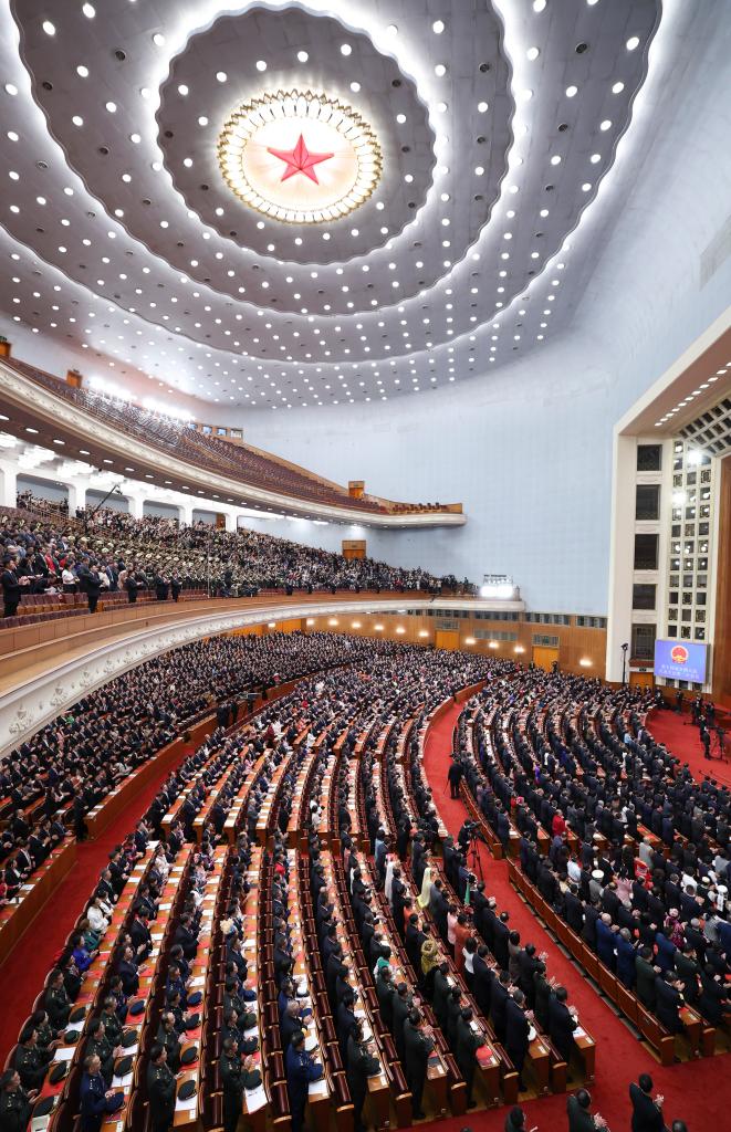 3月11日，第十四屆全國人民代表大會第二次會議在北京人民大會堂舉行閉幕會。新華社記者 丁林 攝