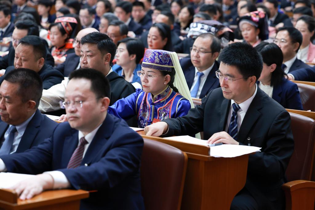 3月11日，第十四屆全國人民代表大會第二次會議在北京人民大會堂舉行閉幕會。新華社記者 王曄 攝