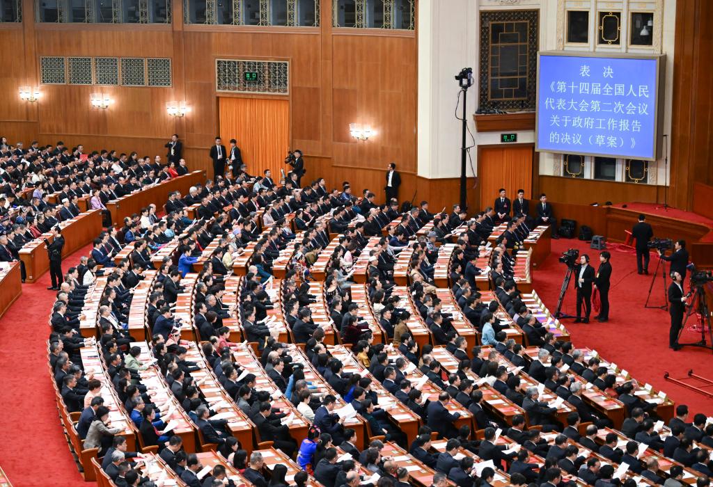 3月11日，第十四屆全國人民代表大會第二次會議在北京人民大會堂舉行閉幕會。新華社記者 牟宇 攝