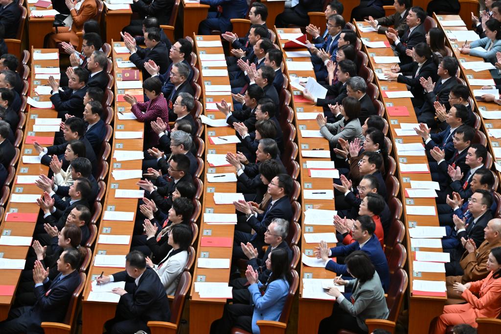 3月11日，第十四屆全國人民代表大會第二次會議在北京人民大會堂舉行閉幕會。新華社記者 李鑫 攝